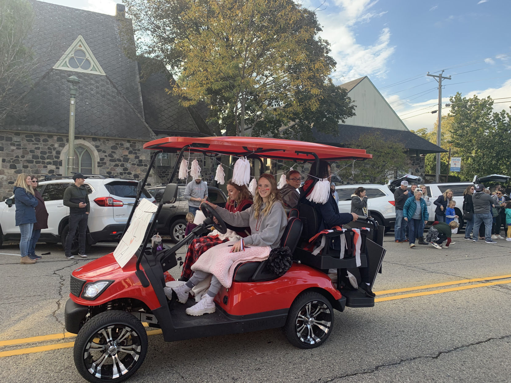 The golf team goes down in golf carts